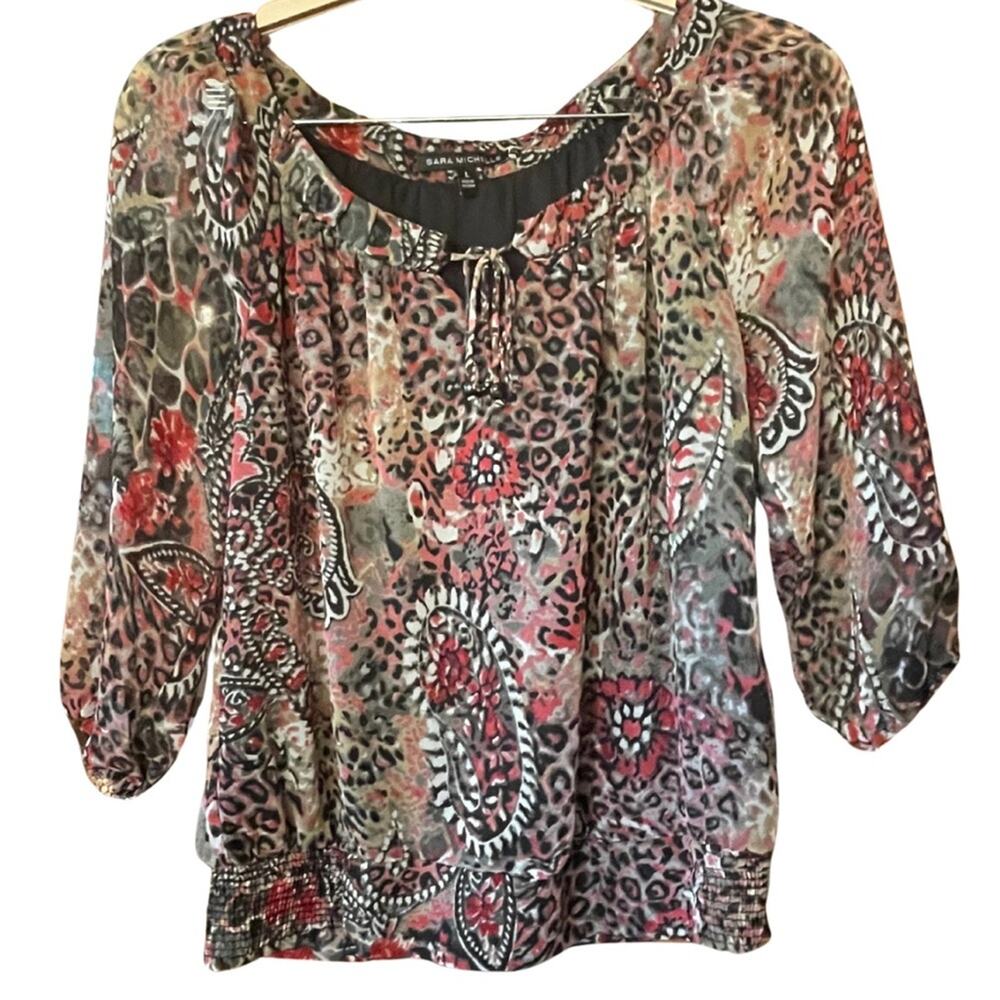 Sarah Michelle animal print 3/4 sleeve pullover blouse. Size L